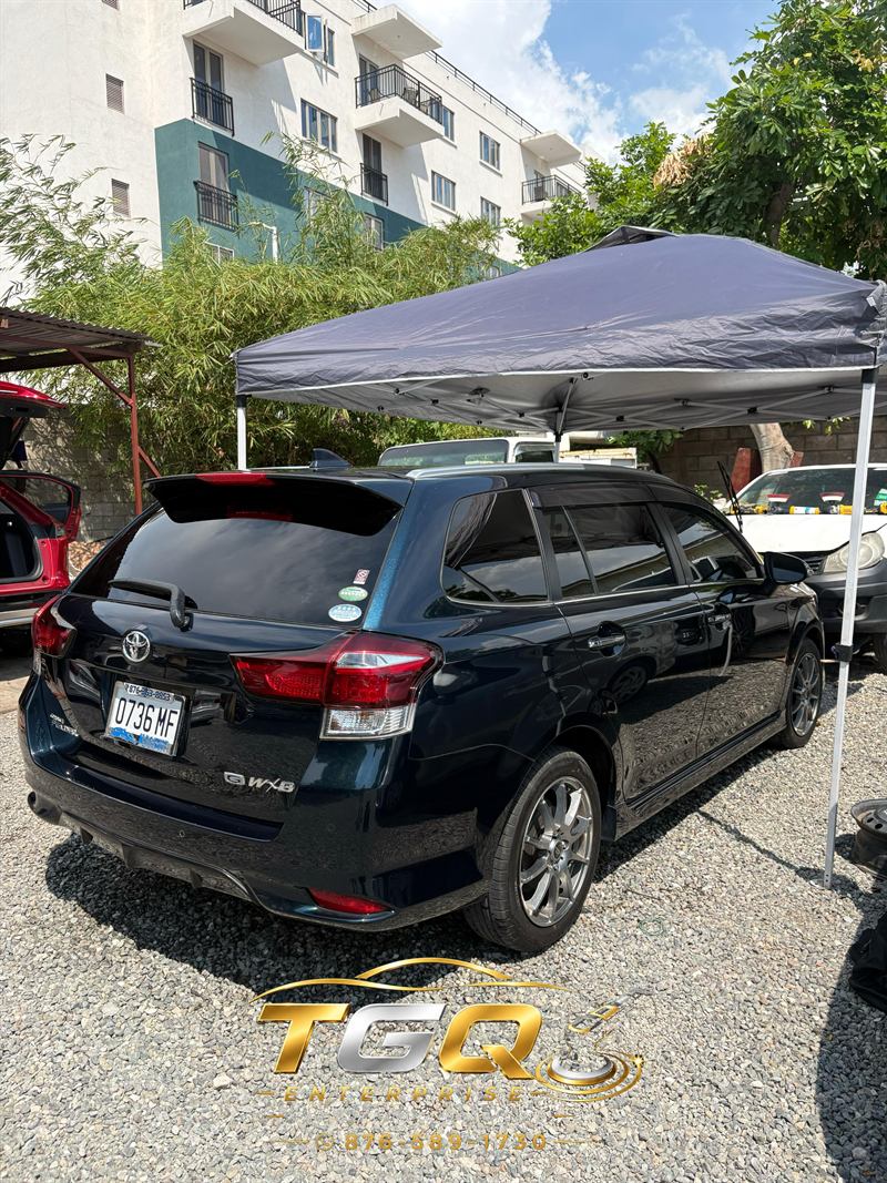 TGQ Enterprise work on a Toyota Fielder